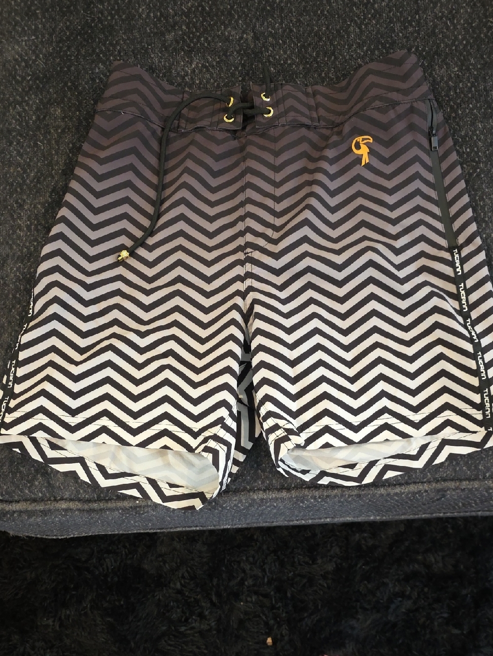 Men's Black & White Chevron Swim Shorts with Gold Accent
